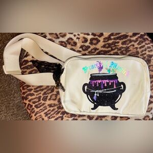 Practical magic crossbody bag